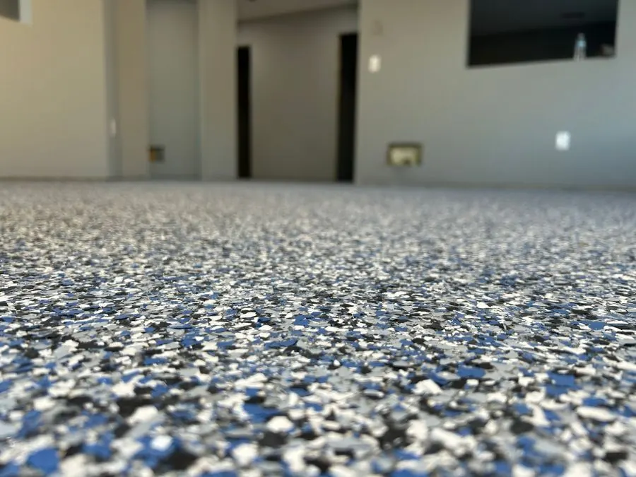 Blue, black, and white flake commercial floor coating in Springfield, MO
