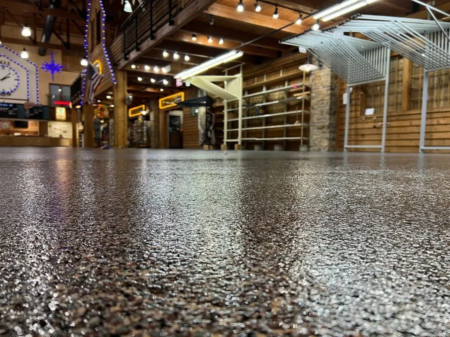 Polished commercial floor coating with decorative lighting in a Springfield, MO retail store