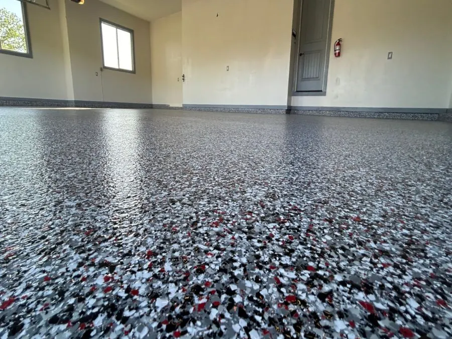 Grey flake epoxy garage floor coating in a vaulted Springfield, MO garage