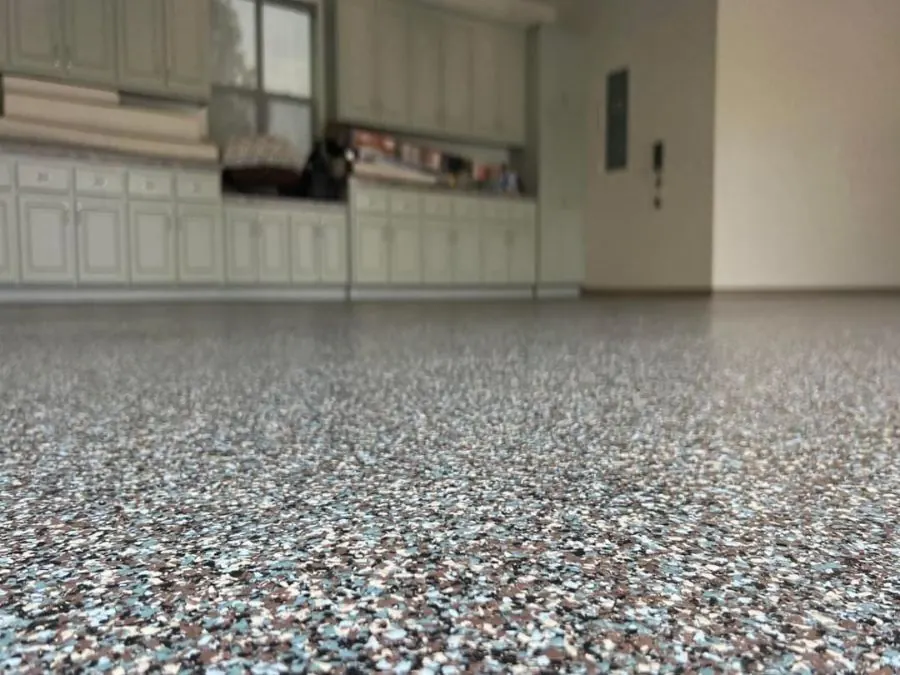 Blue-grey flake epoxy garage floor coating in a Springfield, MO garage
