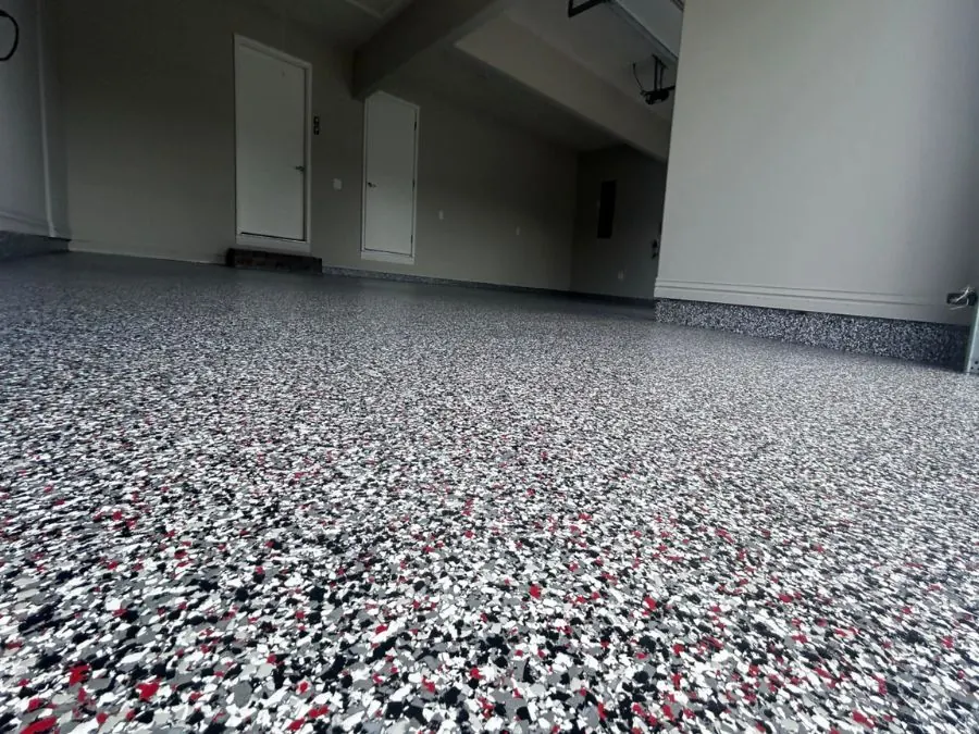 Epoxy garage floor coating with garage door open to driveway in Springfield, MO