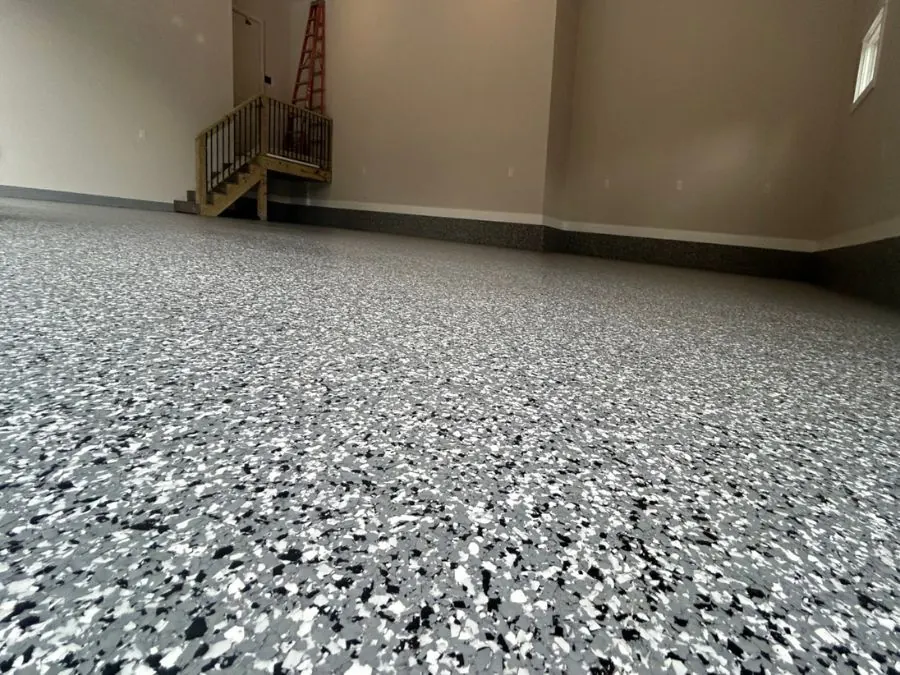 Grey and black flake epoxy garage floor coating in a Springfield, MO garage
