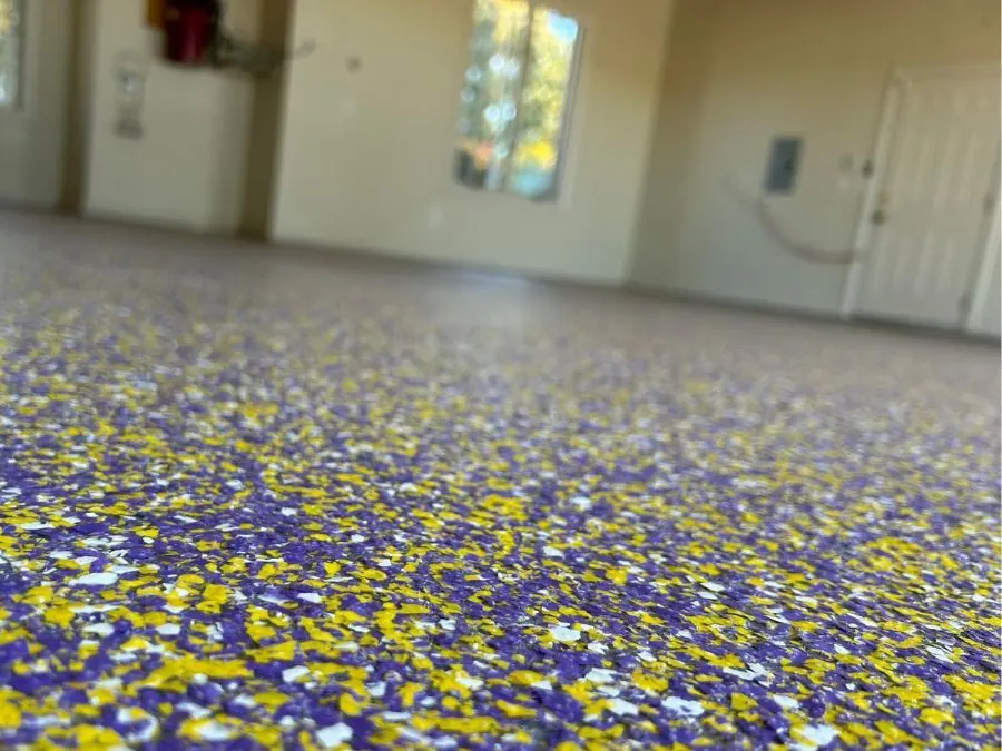 Purple and gold flake epoxy floor coating in a Springfield, MO basement man cave