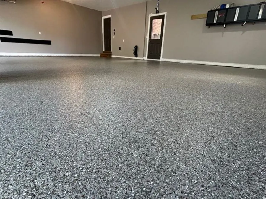 Grey flake epoxy floor coating in a Springfield, MO basement man cave