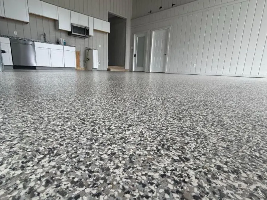 Flake epoxy floor coating in a Springfield, MO basement kitchenette area