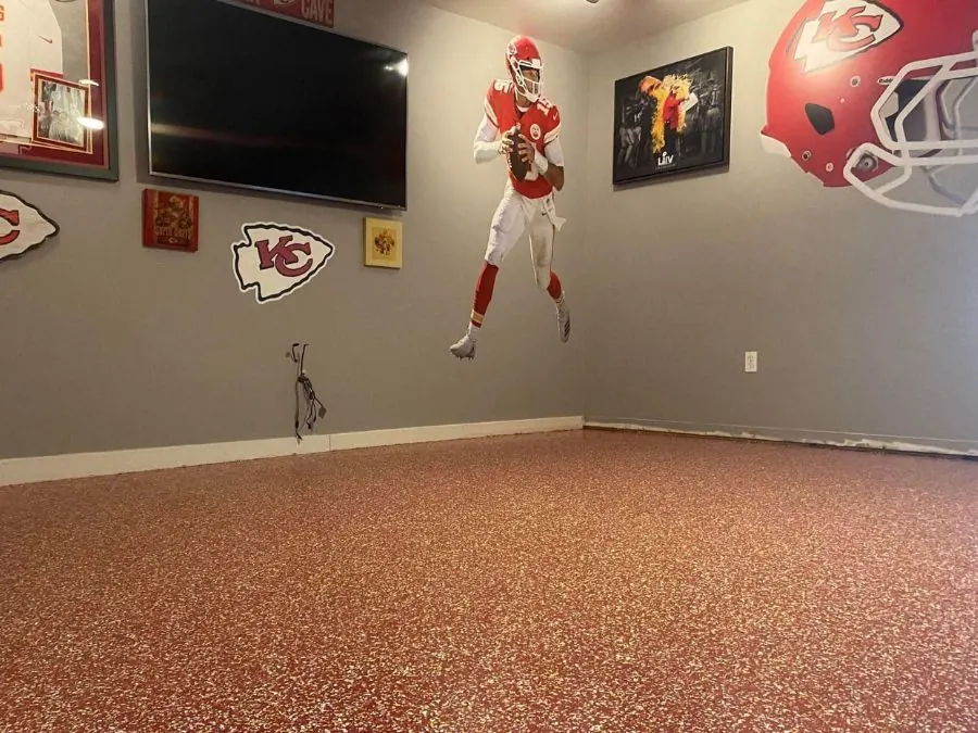 Kansas City Chiefs decorated man cave with red flake epoxy floor coating in Springfield, MO